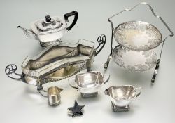 A epns three piece panel sided tea service together with a white metal star paperweight, a