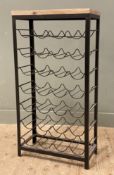 A modern wrought iron and oak wine rack, with capacity for 28 bottles: H. 105cm W. 55cm D. 27cm