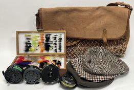Fishing Interest: Brady Halesowen game bag containing four trout fishing reels, comprising 'Adder