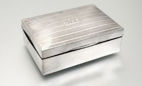 A George V Birmingham silver engine turned cigarette box with engraved initials G.R.T.C to top