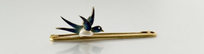 A yellow metal bar brooch set baroque pearl and enamel swallow brooch: l. x 5cm slight chips tips of