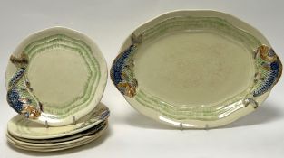 A Clarice Cliff 'Leaping Fish' pattern part dinner service, comprising an oval platter and six