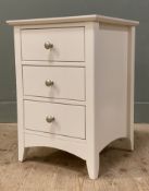 A modern pine and MDF bedside chest of drawers, fitted with three drawers and raised on splayed