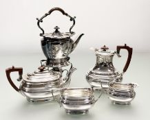 A silver plated four piece oval tea service comprising a tea pot: h. x 11.5cm with matching coffee