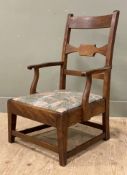 A 19th century mahogany carver chair, carved splat ladder back and open arms, upholstered seat