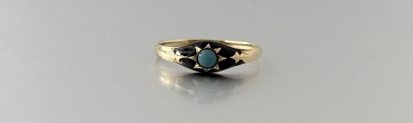 A 19thc eastern european yellow metal star set cabochon turquoise ring within a black enamel