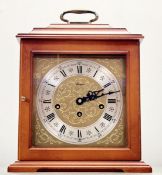 A Rapport cased gilt metal mantle clock, with an internal West German W.Haid mechanism, with key. (