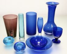 A collection of various glassware comprising, a tall bublous bristol blue vase (h-29cm), a glass