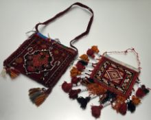 A Persian salt bag decorated with central geometric panel with striped decoration to reverse,