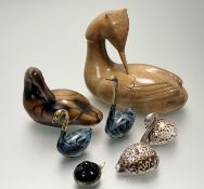 A collection of decorative duck figures comprising, an oak carved mallard (h-18cm), a two toned