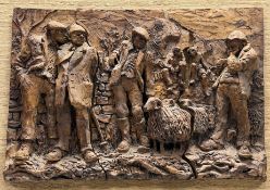 A clay studio work panel countryside scene depicting a group of farmers, one with a sheep at his