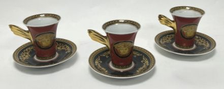 A collection of three Rosenthal for Versace cups and saucers, decorated in the Ikarus Medusa