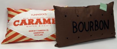 A pair of Nikki McWilliams cotton novelty pillows, one in the form of a Tunnock's Caramel Wafer (