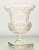 A Cut-Crystal Medicis Style Vase, with thumb cut stem footed on square base, chip to base