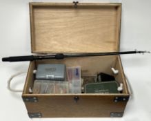 Fishing Interest: a bespoke wooden box with twin rope handles, containing a quantity of spinning