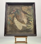 A framed Victorian embroidered panel of a Woodland Pheasant, in a glazed frame. (42cmx33cm)
