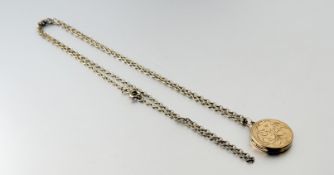 A 9ct gold circular engraved double locket with engraved front in the Edwardian style: d. x 2cm 3.5g