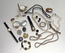 A collection of costume jewellery to include three paste pearl necklaces, a French jet style bead