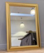 A rectangular hall mirror, in a gilt stepped frame, with a mirror panel to centre. (96cmx71cm)