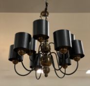 A contemporary chandelier by David Hunt Lighting, model Garbo, bronze-finish with nine arms, each