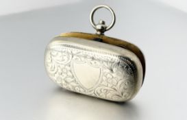 An Edwardian silver plated double sovereign case with an engraved shield front and gilt interior and