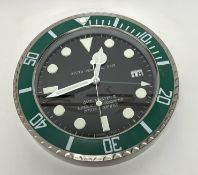 A dealer-display clock styled after a Rolex 