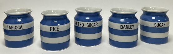 A collection of five vintage blue and white striped Cornish Kitchen Ware by TG Green & Co Ltd, green