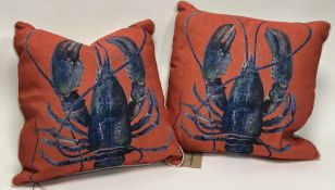 A pair of Emma Bridgewater linen square pillows, blue lobsters on red (h. 38cm) with original