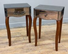 A pair of Laura Ashley bedside tables, mirrored tops and sides raised on hardwood cabriole supports: