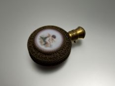 A late 19thc Continental cranberry glass scent bottle with gilt metal filigree casing, the