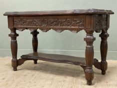 A 17th century-style carved mahogany hall table, shaped top over carved frieze with scrolling floral