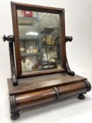 A 19th Century mahogany box base dressing table mirror with two rounded drawers, raised on four