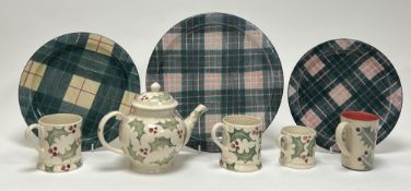 A collection of Emma Bridgewater wares decorated with holly and berries, comprising a pair of