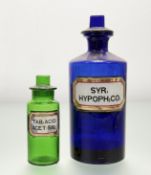 A group of two glass apothocary jars, a bristol blue jar reading - SYR: HYPOPH:CO: (h-23.5cm) and