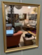 A modern gilt framed rectangular mirror with beaded and blue-toned inner border (h. 56cm x 46cm)