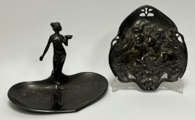 An early 20thc Art Nouveau pewter dish, embossed with two maidens and flowers to the front, complete