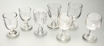 V A group of seven various cut glass rummers comprising, a pair and one moulded rummers and a