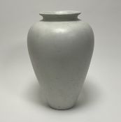 An Alcobaca Portuguese vase of bulbous form with fluted neck, marked verso (h. 35cm)