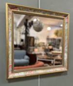 A 20thc decorative wall-hanging giltwood mirror with carved beaded border and painted floral motif