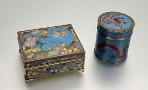 A Japanese cloissone brass box, the top decorated with a landscape with birds, chrysanthemum and