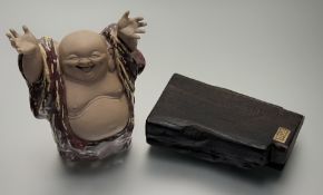 A Chinese Shiwan glazed pottery model of a Laughing Budahh (h-29cm), with stamp marks verso,