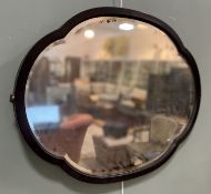 An early 20thc mahogany framed quatrefoil shaped wall mirror with bevel glass mirror plate (w.