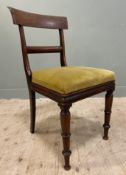 A Victorian mahogany side chair, curved bar back and splat over olive green drop-in seat, on