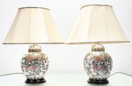 A pair of chinese ginger jar shaped table lamps, in a bloooming roses lustre glaze highlighted