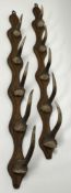 A pair of fishing rod/ coat racks, each with shaped oak back boards and antler hooks (l. 79cm) (2)