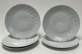 A collection of five 'Ocean' CND France white plates with moulded fish to top (d. 24cm) (5)