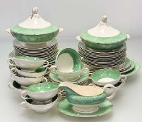 A Royal Cauldon green with bow garland pattern part dinner service comprising, two lidded tureens (