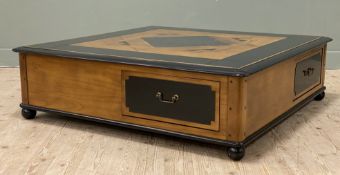 A bespoke walnut and lacquer coffee table, parquetry top with granite inset over four drawers,