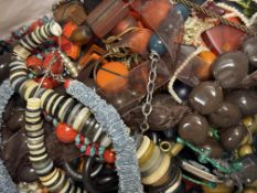 A horn button bead necklace together with a large collection of paste pearl, multistand coloured