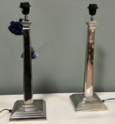 A pair of nickel finish table lamps of stepped tapered form, raised on square bases (h. 56cm) (2)